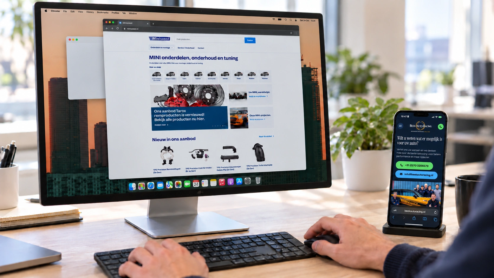 Desktop workstation with a website and a mobile page in Safari — generated visualisation